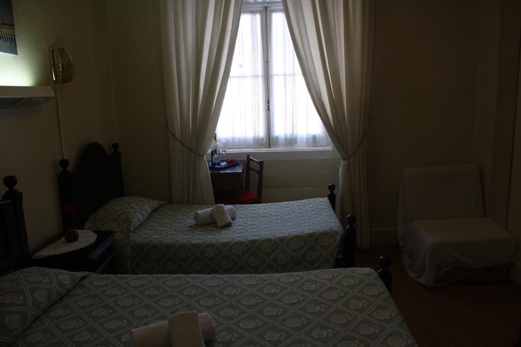 Hotel Pensao Residencial Estrela Do Mondego Lissabon Zimmer foto