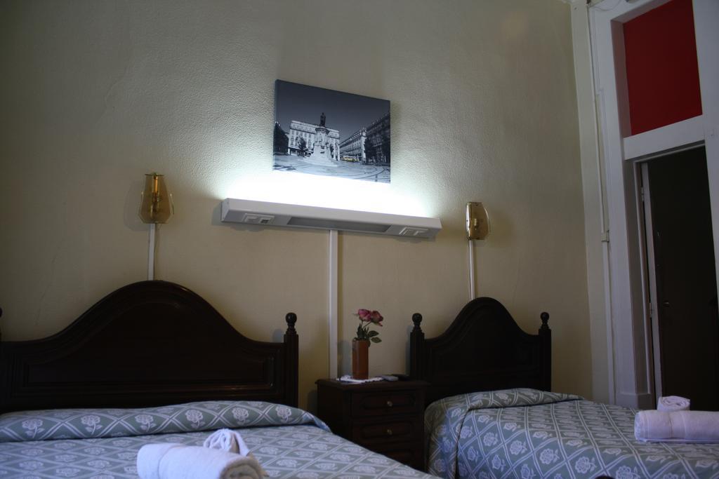 Hotel Pensao Residencial Estrela Do Mondego Lissabon Zimmer foto