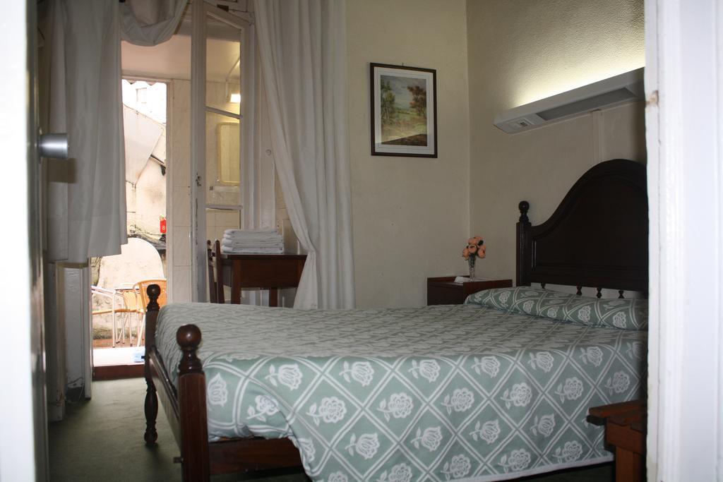 Hotel Pensao Residencial Estrela Do Mondego Lissabon Zimmer foto